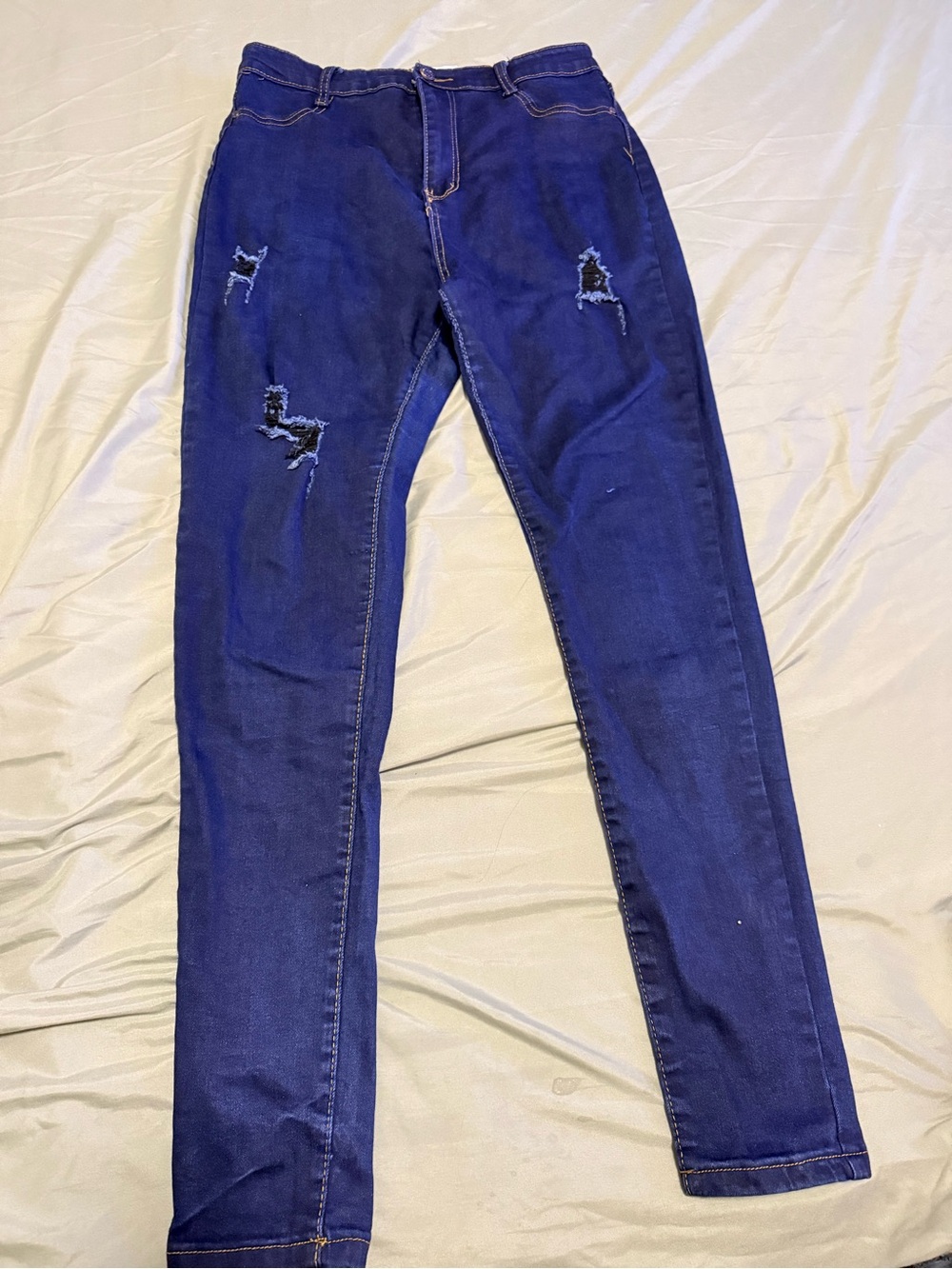 Women’s Skinny Ripped Jeans in Dark Blue